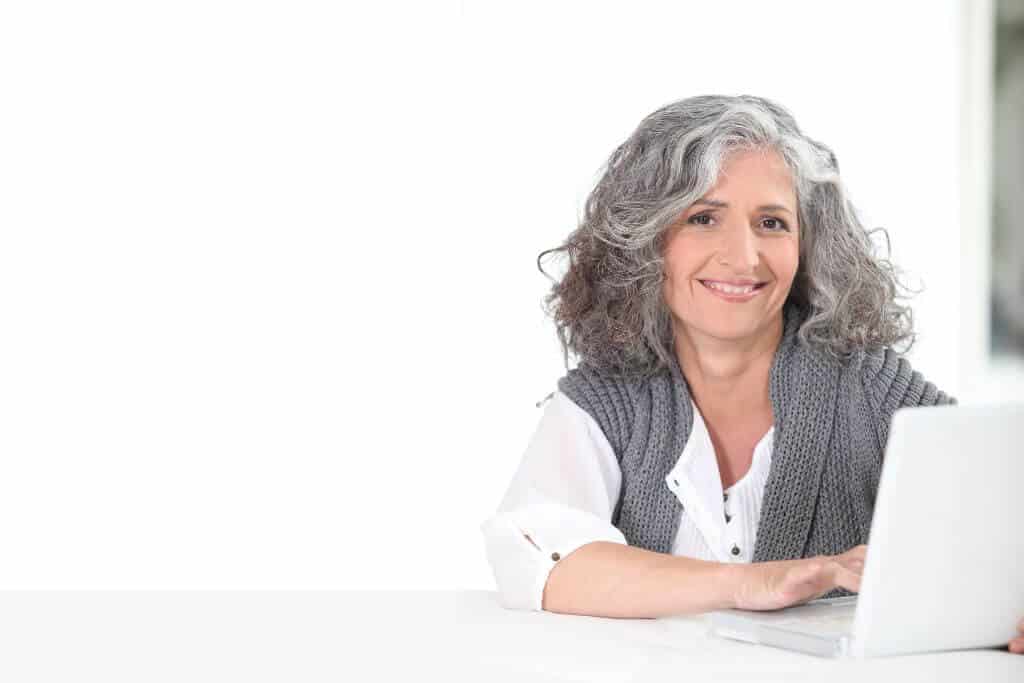 older woman maintaining her wordpress website
