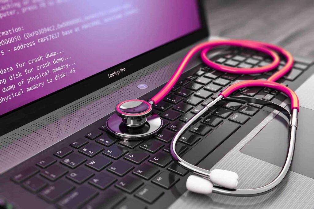 website health - laptop with stethoscope